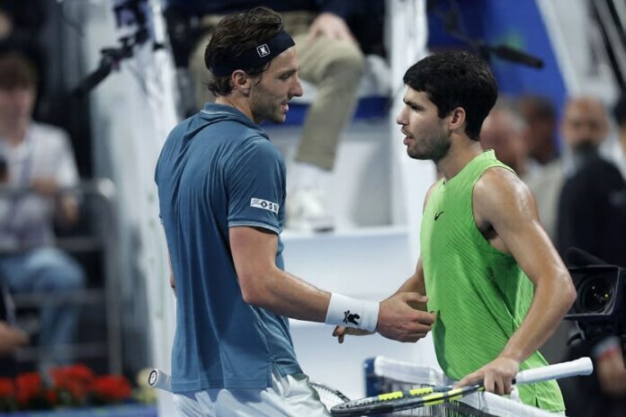 gettyimages-rinderknech-alcaraz-doha (1)
